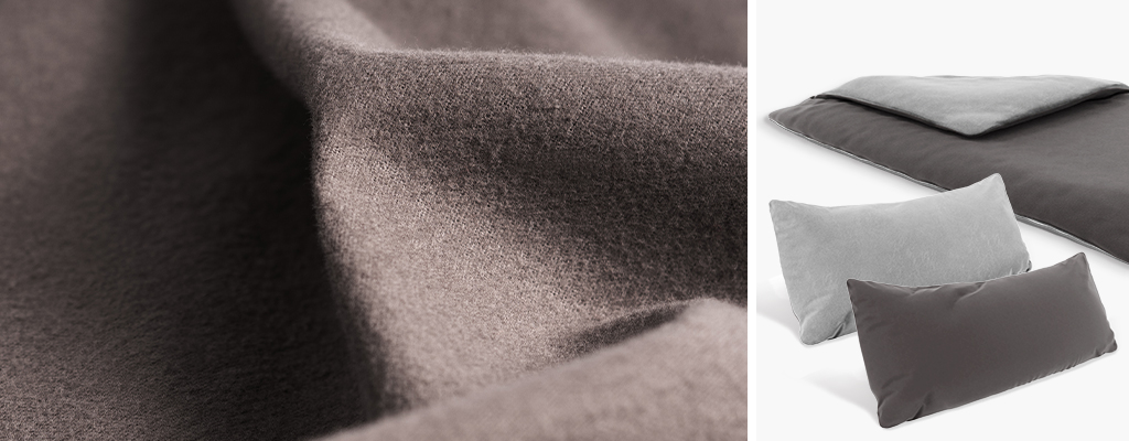 Foto links: Nahaufnahme von dunkelgrauer Flanell-Bettwäsche. Das Bettwäsche Material wirkt angeraut und kuschelig.
Foto rechts: Zwei Kissen und eine Bettdecke in BODYGUARD Flanell-Bettwäsche in Silber und Anthrazit.